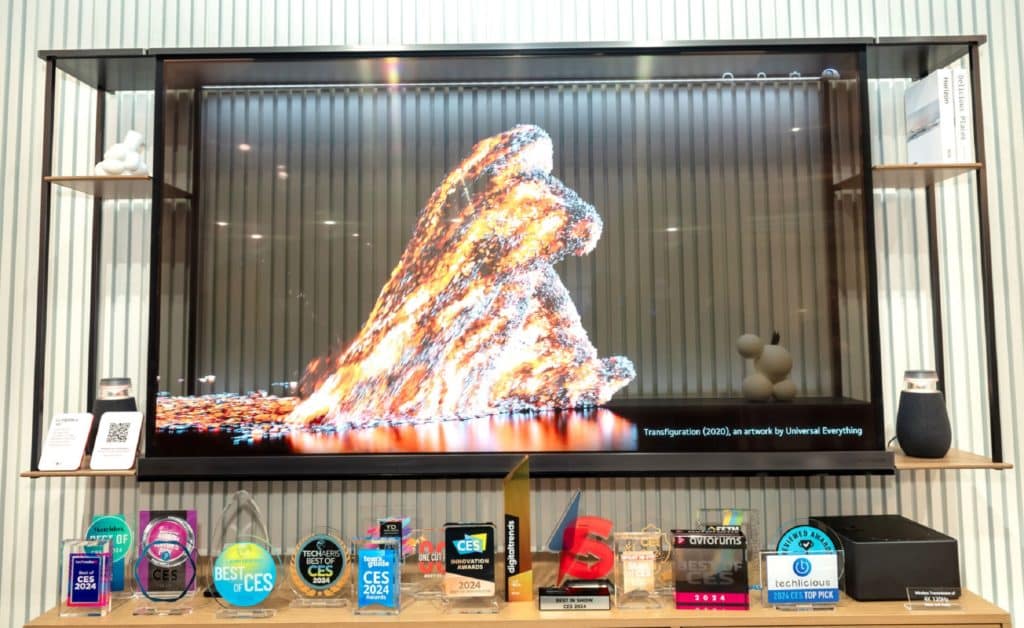 LG's new transparent TV on display with the company's numerous awards.